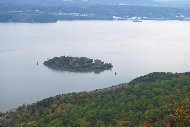 The ruined arches of Bannerman Castle on Pollepel Island, seen from the ridge above the Hudson