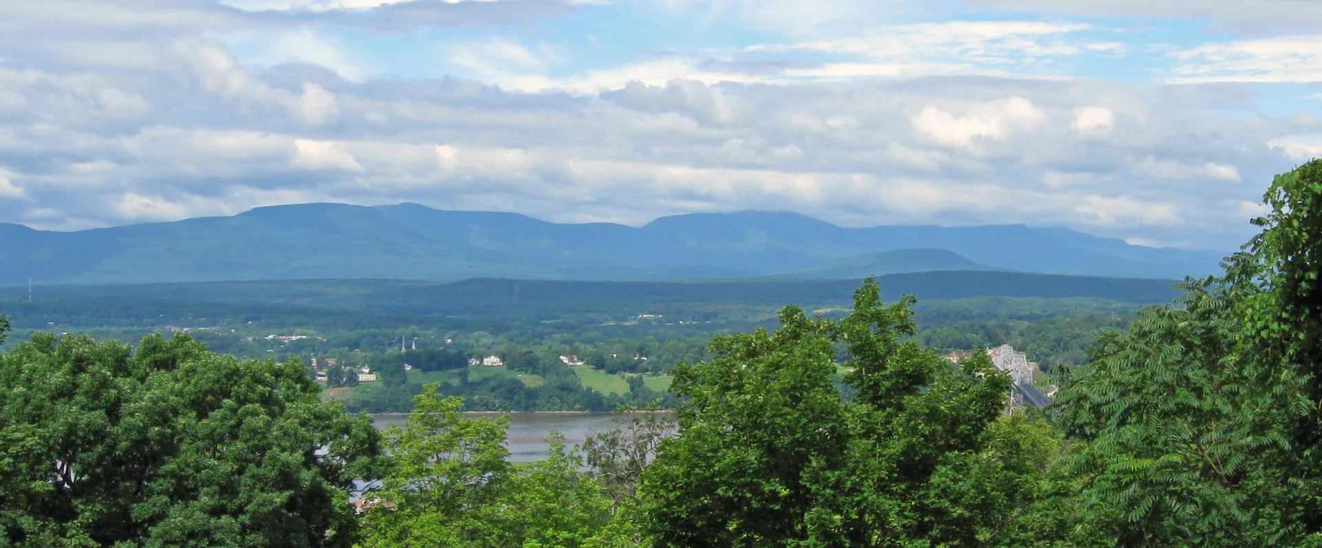 The long wall of the Catskill escarpment across the valley, seen from Olana