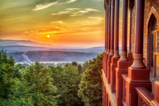 Sunset over the Hudson Valley framed by the Moorish columns of Olana's veranda